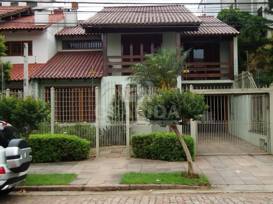 Foto 1 de Casa com 4 Quartos à venda, 324m² em Jardim Lindóia, Porto Alegre