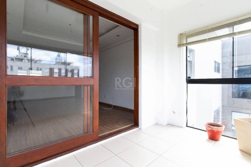 Foto 3 de Apartamento com 1 Quarto à venda, 70m² em Santo Antônio, Porto Alegre