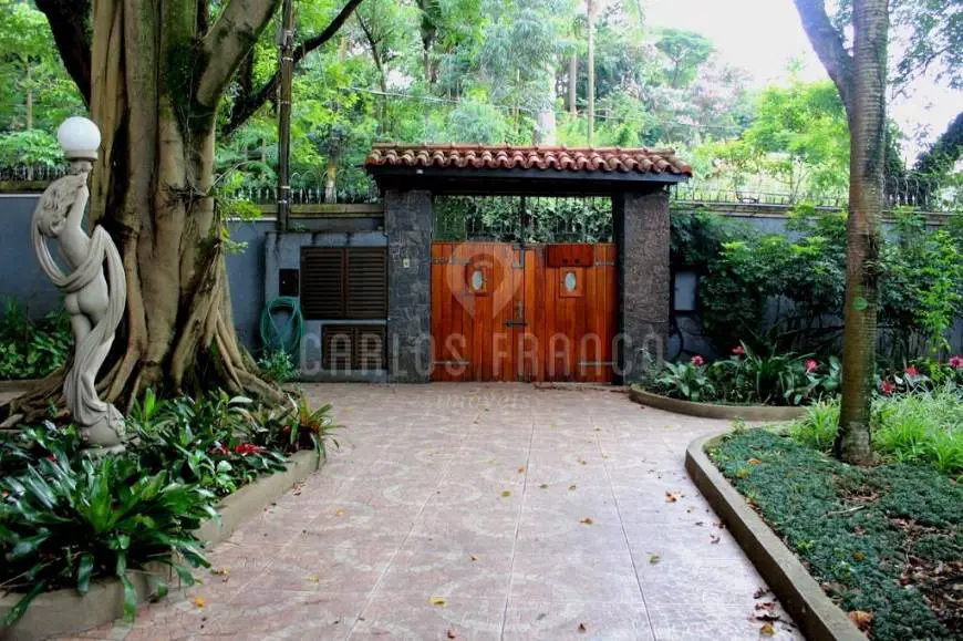 Foto 4 de Sobrado com 4 Quartos à venda, 374m² em Jardim Petrópolis, São Paulo