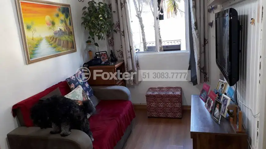Foto 1 de Apartamento com 2 Quartos à venda, 36m² em Vila Nova, Porto Alegre