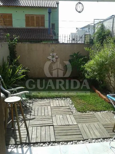 Foto 2 de Sobrado com 2 Quartos à venda, 87m² em Guarujá, Porto Alegre