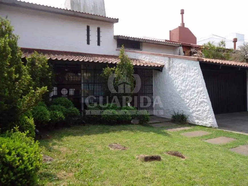 Foto 2 de Casa com 4 Quartos à venda, 319m² em Tristeza, Porto Alegre
