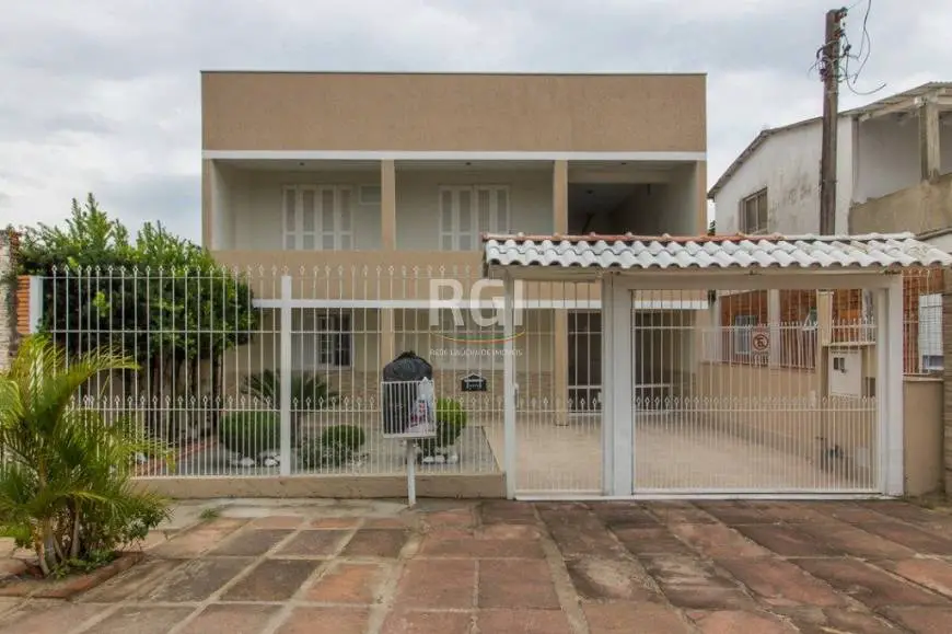 Foto 1 de Casa com 8 Quartos à venda, 388m² em Rubem Berta, Porto Alegre