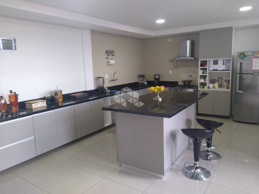 Foto 5 de Casa com 4 Quartos à venda, 467m² em Costa E Silva, Porto Alegre