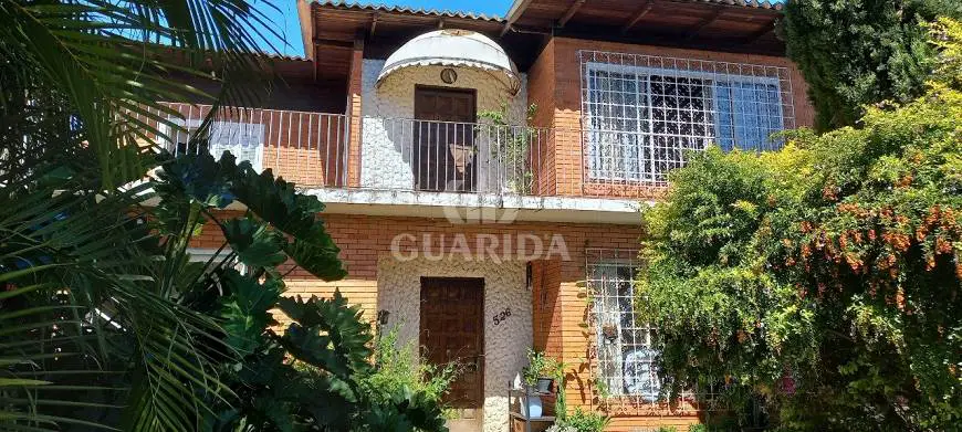 Foto 2 de Casa com 5 Quartos à venda, 240m² em Ipanema, Porto Alegre