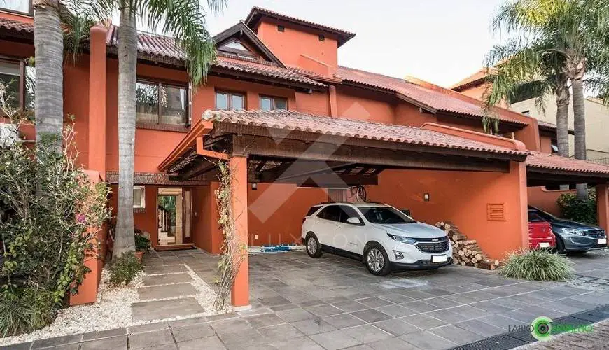 Foto 1 de Casa de Condomínio com 3 Quartos para alugar, 520m² em Três Figueiras, Porto Alegre
