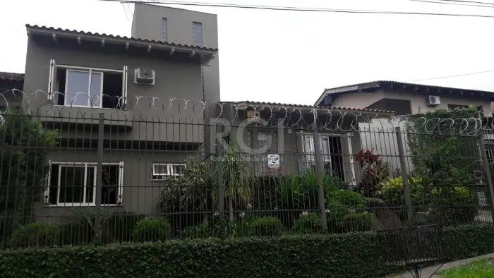 Foto 2 de Casa com 4 Quartos à venda, 139m² em Ipanema, Porto Alegre