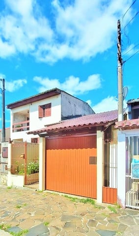 Foto 1 de Casa com 2 Quartos à venda, 90m² em Costa E Silva, Porto Alegre