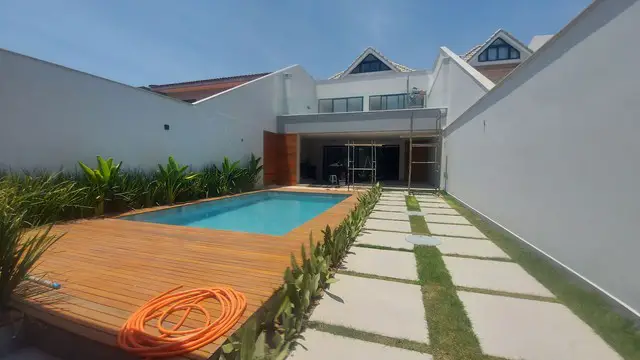 Foto 1 de Casa de Condomínio com 5 Quartos à venda, 450m² em Barra da Tijuca, Rio de Janeiro