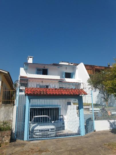 Foto 2 de Sobrado com 4 Quartos para venda ou aluguel, 266m² em Tristeza, Porto Alegre