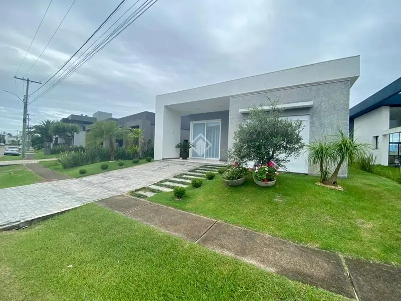 Foto 1 de Casa de Condomínio com 4 Quartos à venda, 200m² em Centro, Capão da Canoa