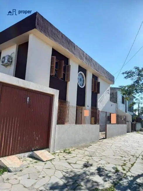 Foto 1 de Sobrado com 4 Quartos à venda, 200m² em Areal, Pelotas
