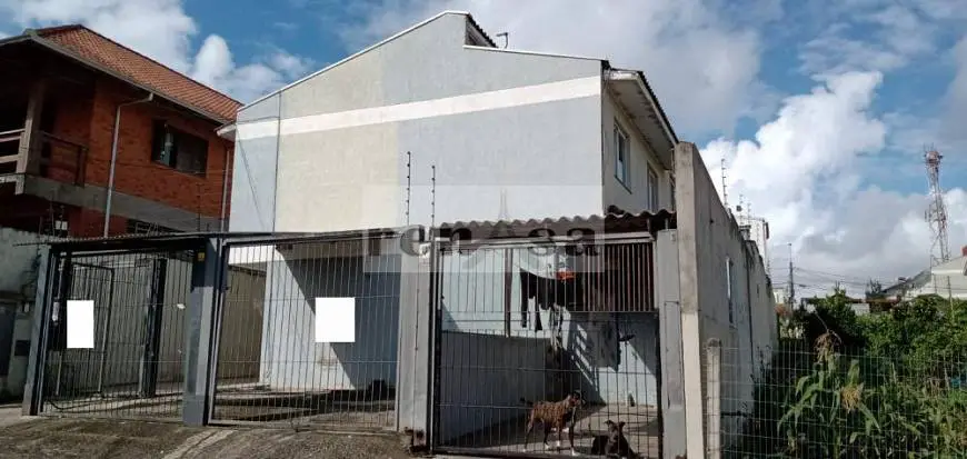 Foto 1 de Casa com 2 Quartos à venda, 57m² em Cidade Nova, Caxias do Sul