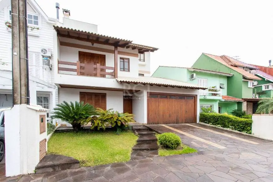 Foto 1 de Casa com 4 Quartos à venda, 265m² em Cavalhada, Porto Alegre