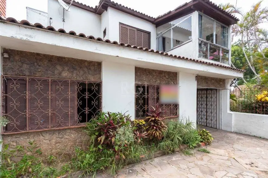 Foto 2 de Casa com 6 Quartos à venda, 149m² em Nonoai, Porto Alegre