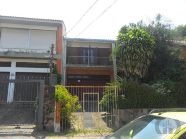 Foto 2 de Casa com 4 Quartos à venda, 100m² em Santo Antônio, Porto Alegre