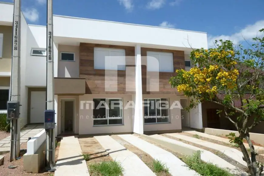 Foto 1 de Casa de Condomínio com 3 Quartos à venda, 110m² em Alto Petrópolis, Porto Alegre