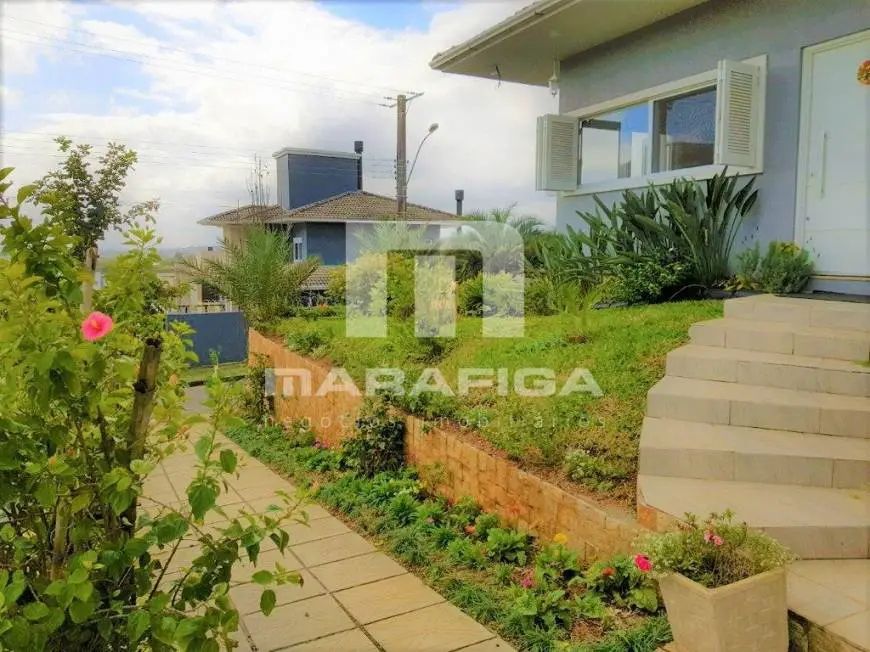 Foto 2 de Casa de Condomínio com 4 Quartos à venda, 314m² em Alto Petrópolis, Porto Alegre