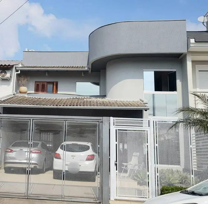 Foto 1 de Casa de Condomínio com 4 Quartos à venda, 216m² em Alto Petrópolis, Porto Alegre