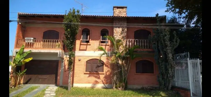 Foto 1 de Casa com 3 Quartos à venda, 326m² em Parque dos Maias, Porto Alegre