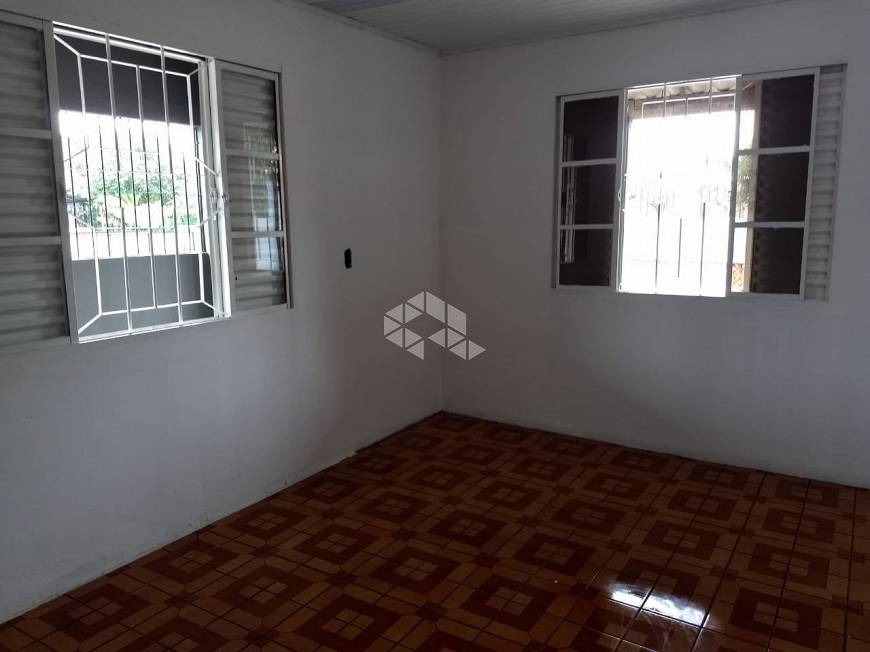 Foto 1 de Casa com 2 Quartos à venda, 100m² em Guajuviras, Canoas