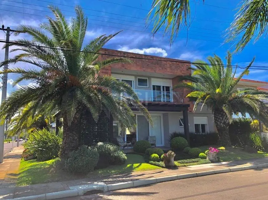 Foto 1 de Casa com 4 Quartos à venda, 273m² em Zona Nova, Capão da Canoa