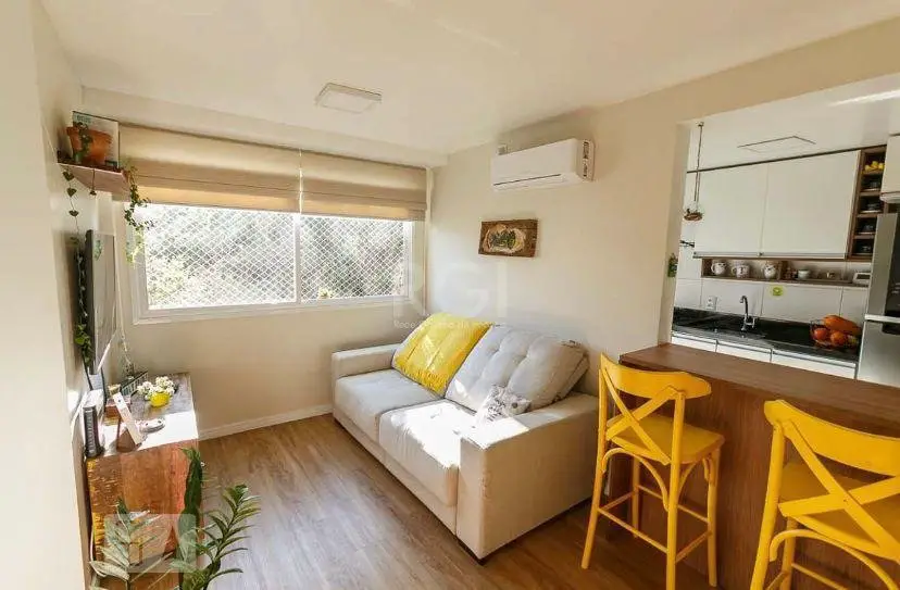 Foto 1 de Apartamento com 2 Quartos à venda, 49m² em Vila Nova, Porto Alegre