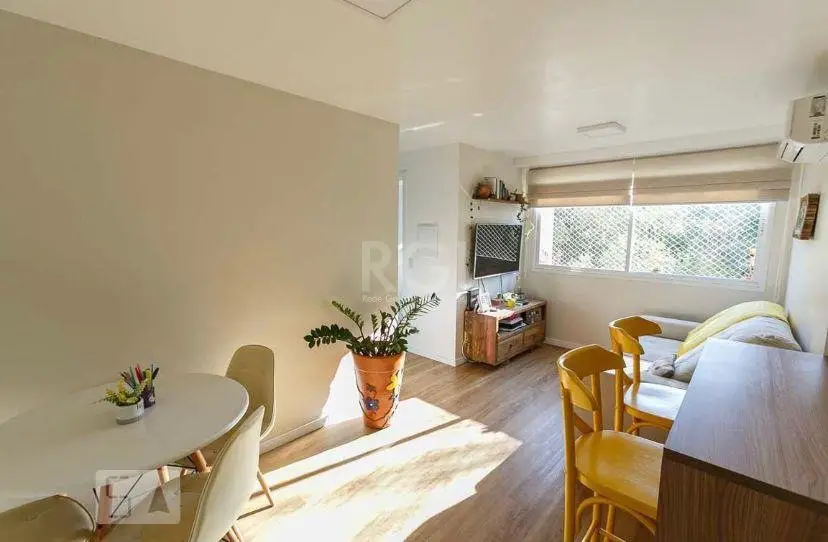 Foto 2 de Apartamento com 2 Quartos à venda, 49m² em Vila Nova, Porto Alegre