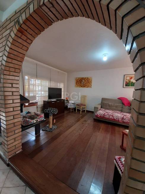 Foto 1 de Casa com 3 Quartos à venda, 262m² em Auxiliadora, Porto Alegre