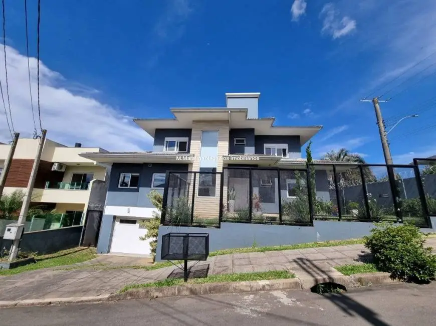 Foto 1 de Casa de Condomínio com 4 Quartos à venda, 302m² em Alto Petrópolis, Porto Alegre