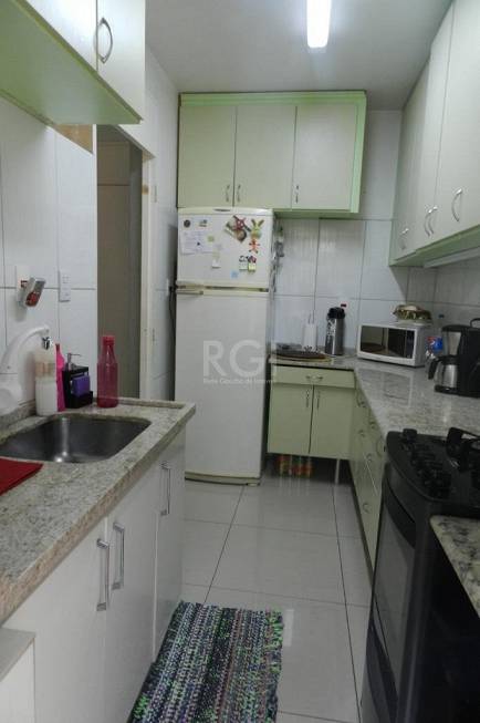 Foto 5 de Apartamento com 3 Quartos à venda, 66m² em Vila Nova, Porto Alegre