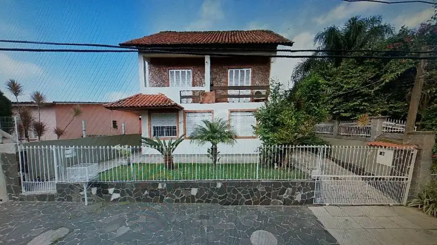 Foto 1 de Casa com 4 Quartos à venda, 180m² em Rubem Berta, Porto Alegre