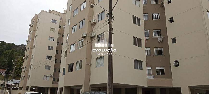 Foto 1 de Apartamento com 3 Quartos à venda, 55m² em Ponta de Baixo, São José