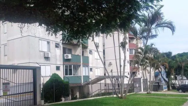 Foto 1 de Apartamento com 2 Quartos à venda, 59m² em Coqueiros, Florianópolis