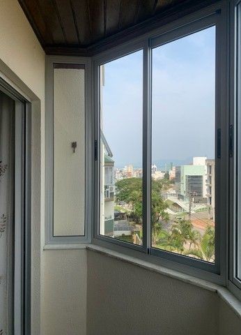 Foto 4 de Apartamento com 2 Quartos à venda, 59m² em Coqueiros, Florianópolis
