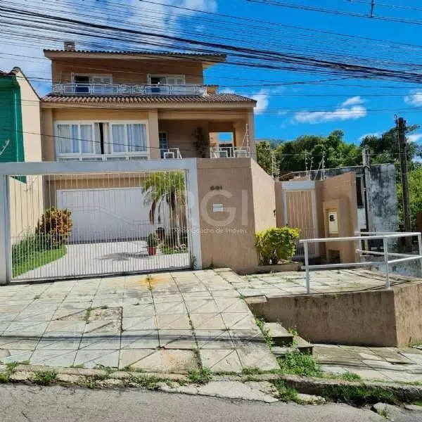 Foto 1 de Casa com 3 Quartos à venda, 330m² em Santo Antônio, Porto Alegre