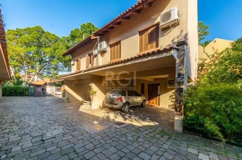 Foto 1 de Casa com 4 Quartos à venda, 208m² em Ipanema, Porto Alegre