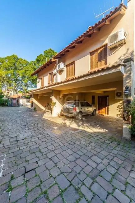 Foto 2 de Casa com 4 Quartos à venda, 208m² em Ipanema, Porto Alegre