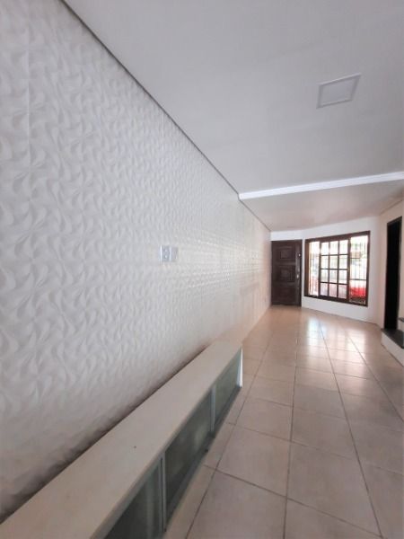 Foto 4 de Casa com 3 Quartos à venda, 214m² em Ipanema, Porto Alegre