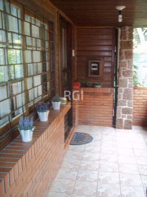Foto 5 de Casa com 4 Quartos à venda, 205m² em Teresópolis, Porto Alegre