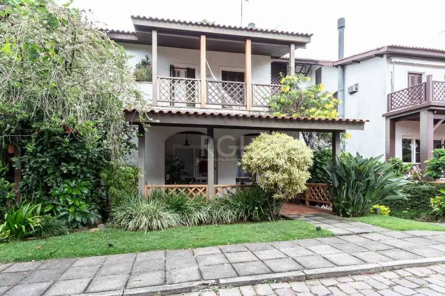 Foto 1 de Casa com 3 Quartos à venda, 340m² em Pedra Redonda, Porto Alegre