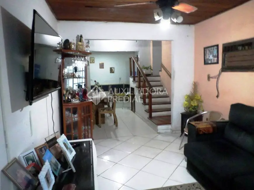 Foto 1 de Casa com 4 Quartos à venda, 154m² em Cavalhada, Porto Alegre