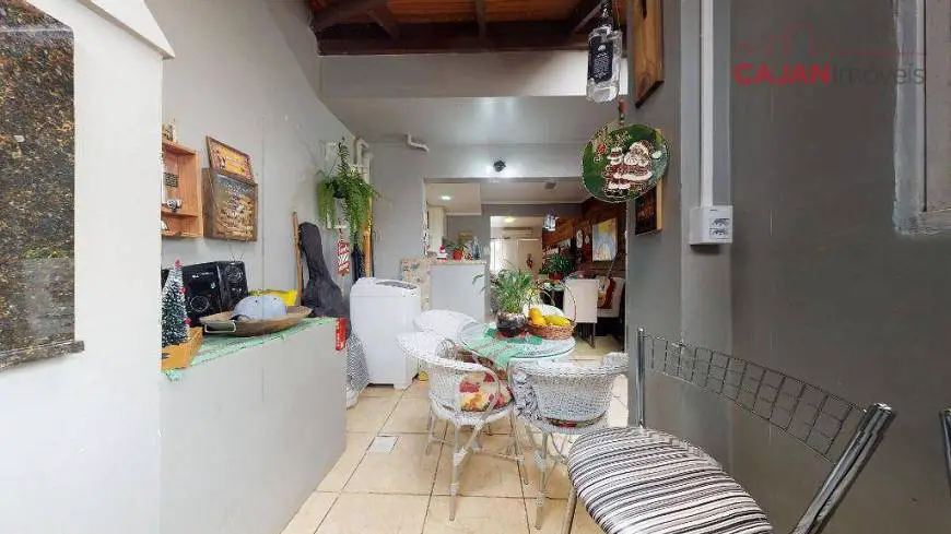 Foto 1 de Casa de Condomínio com 2 Quartos à venda, 94m² em Humaitá, Porto Alegre