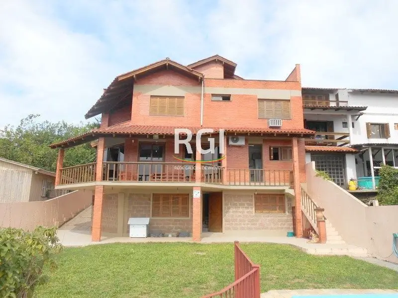 Foto 1 de Casa com 3 Quartos à venda, 430m² em Vila Nova, Porto Alegre