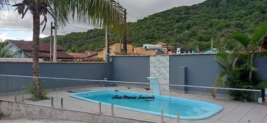 Foto 3 de Casa com 4 Quartos à venda, 170m² em Massaguaçu, Caraguatatuba