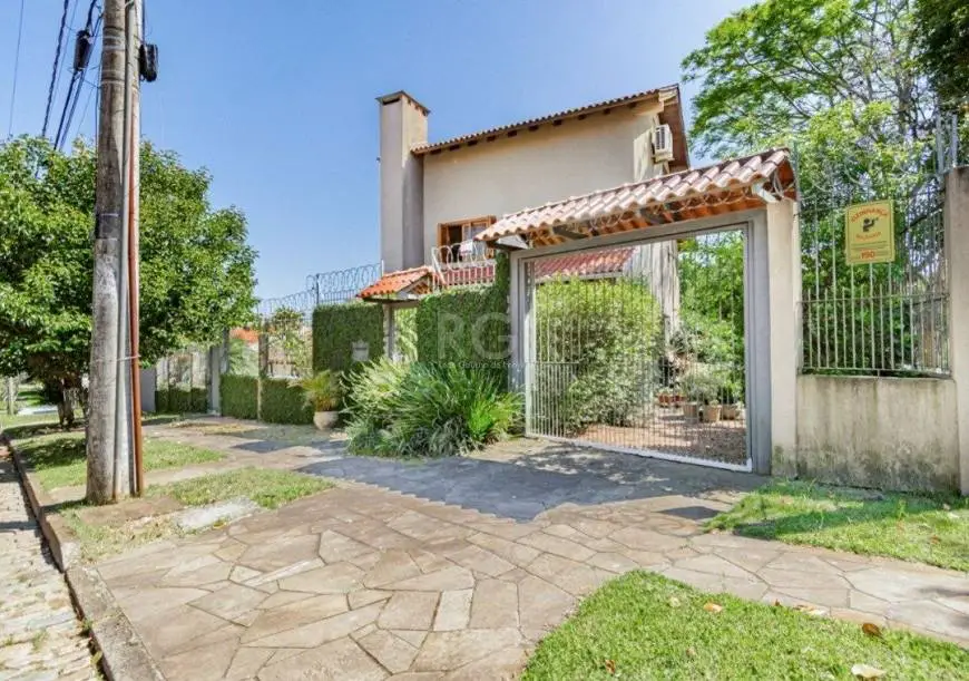 Foto 2 de Casa com 3 Quartos à venda, 255m² em Ipanema, Porto Alegre
