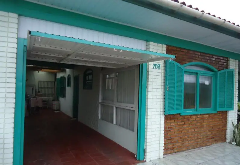 Foto 1 de Casa com 5 Quartos à venda, 170m² em Centro, Torres