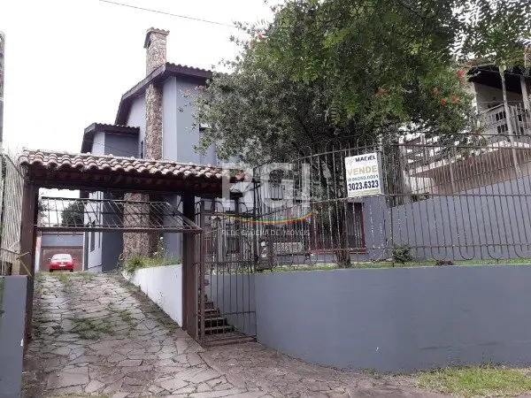 Foto 2 de Casa com 5 Quartos à venda, 316m² em Vila Assunção, Porto Alegre