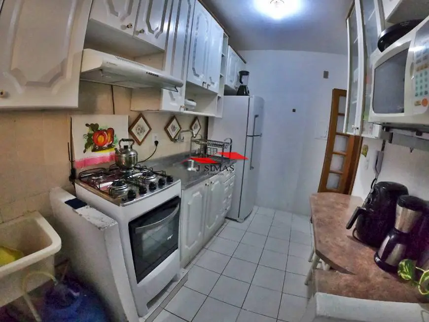 Foto 4 de Apartamento com 2 Quartos à venda, 52m² em Glória, Porto Alegre