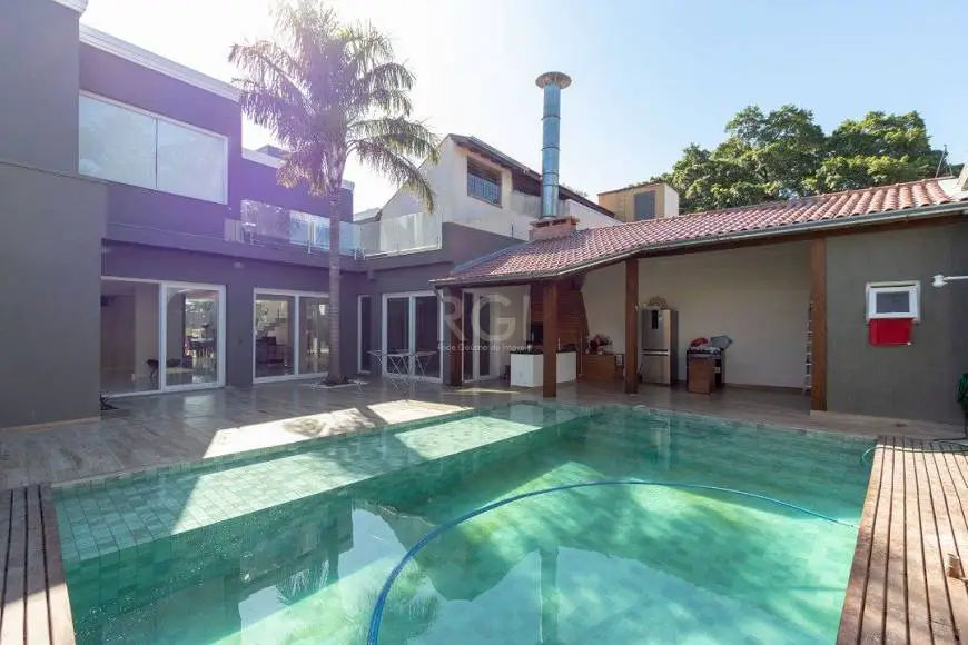 Foto 2 de Casa com 4 Quartos à venda, 450m² em Ipanema, Porto Alegre